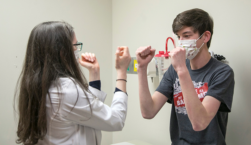 A patient is examined in stroke clinic.